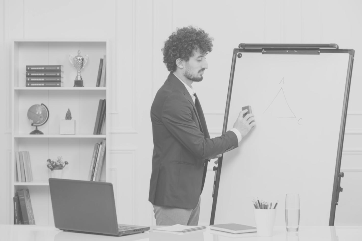 Professional reviewing detailed financial variance reports and analysis documents